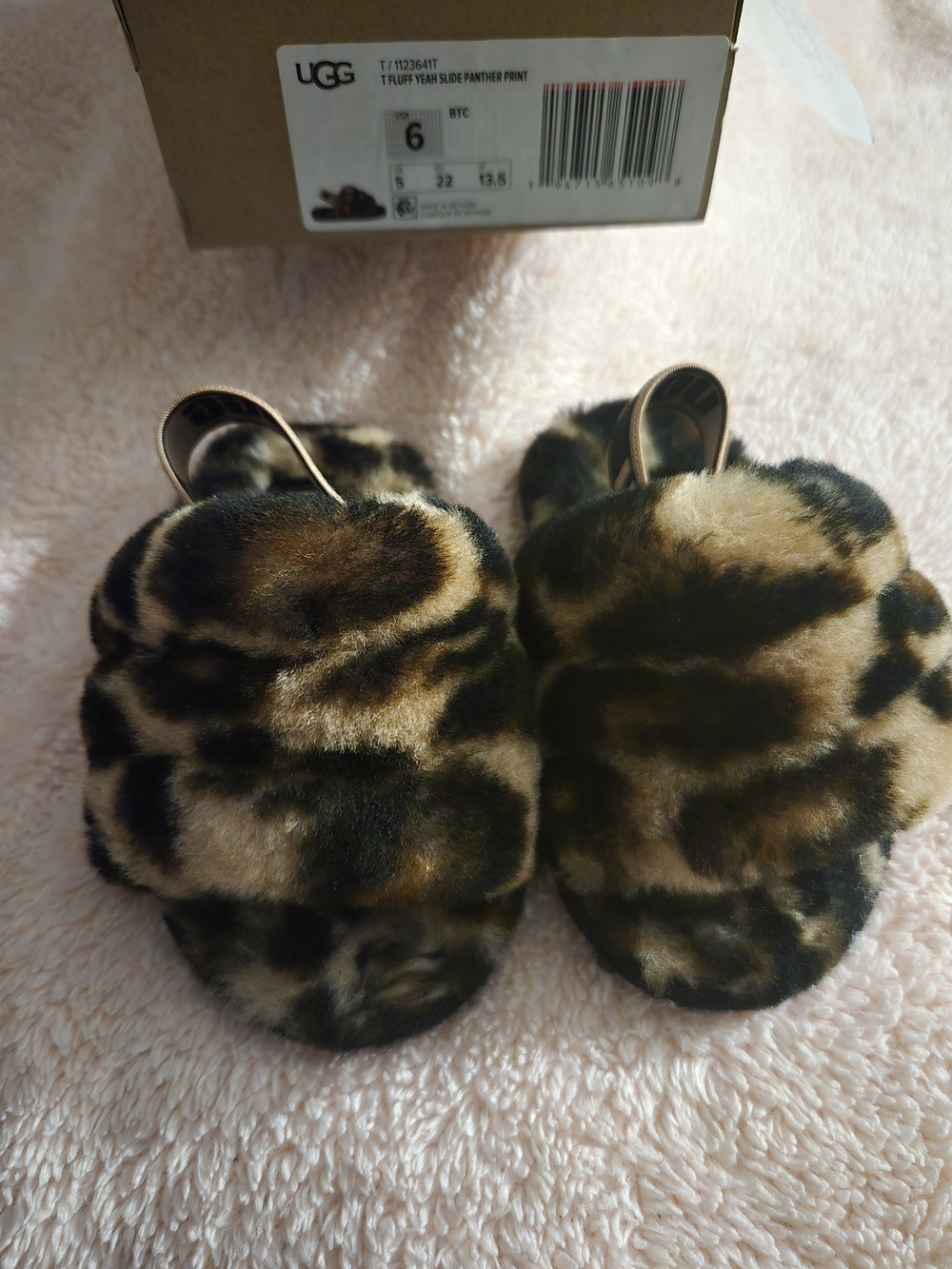 UGG Leopard Print Faux Fur Slides in Brown and Black